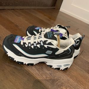 Skechers D’Lite Navy Blue lace-up sneakers